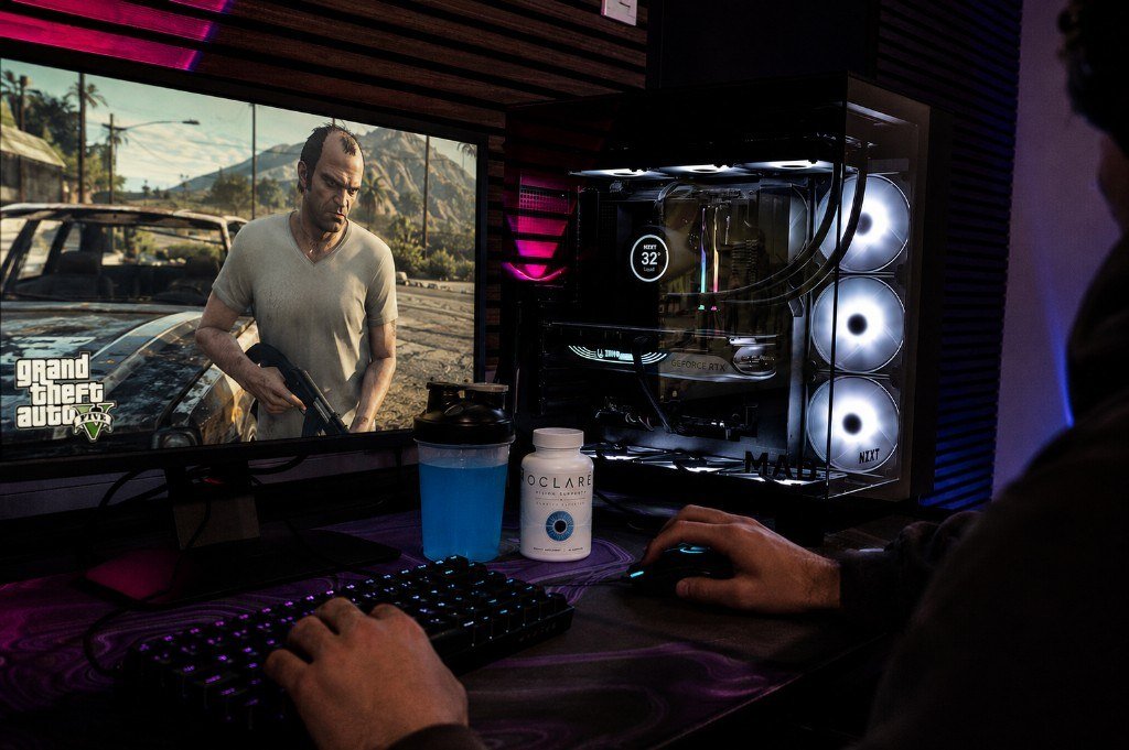 Gaming desk setup with monitor and RGB lighting